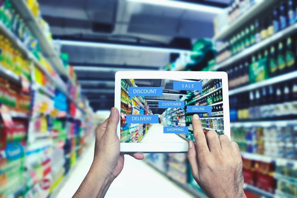 Retail customer interacting with immersive in-store technology for a personalized shopping experience