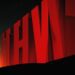Netflix promotional image showing AI-generated VFX of a collapsing building alongside a VFX artist at work."