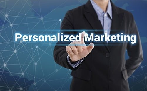 A marketer analyzing customer data to create hyper-personalized campaigns in 2025.