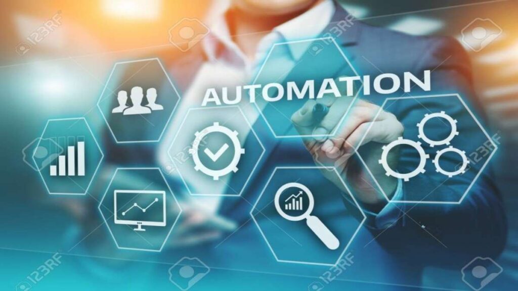 Engineers and AI-powered robots working together in a modern automated facility, symbolizing the future of work through automation.